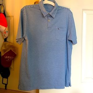 Knit vineyard vines polo shirt.  Size 12-14. Light blue white stripes.